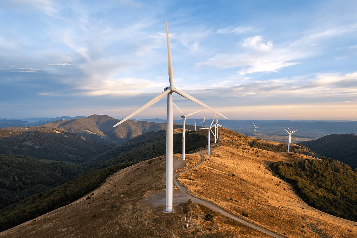 Wind turbines across a mountain ridge