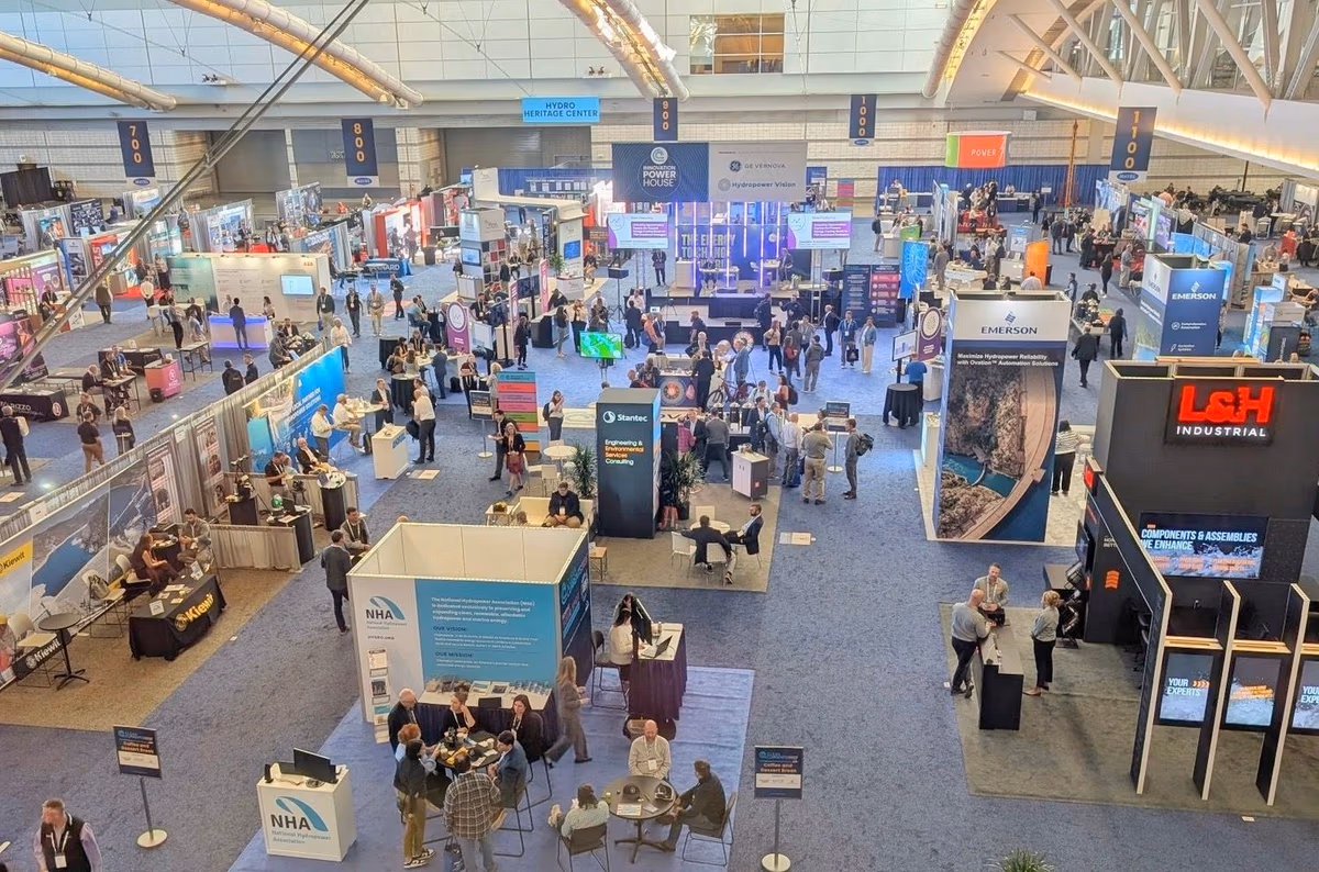 Aerial view of the exhibit hall floor at Clean Currents 2025 in Pittsburgh, with the National Hydropower Association booth in the foreground
